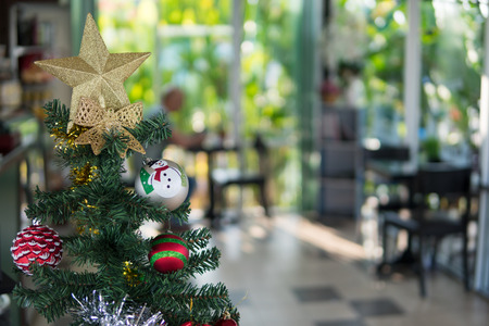 Decorated Christmas tree on blurredの写真素材