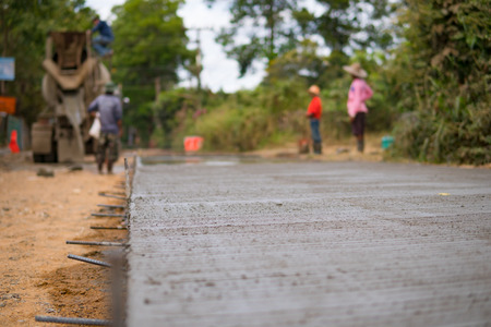 Spreading concrete for road concrete   repairの写真素材