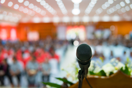 Close up of microphone in concert hall or conference roomの写真素材