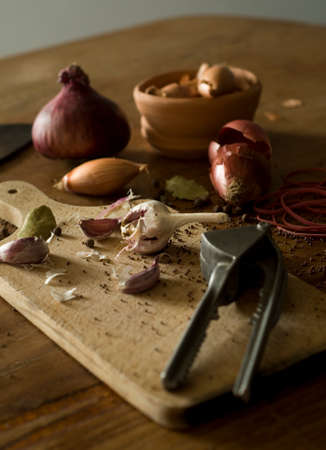 Garlic with onions on wooden tableの写真素材