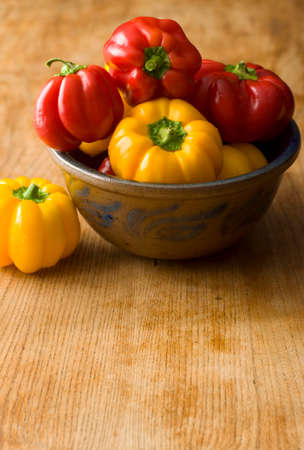 Red and yellow peppersの写真素材