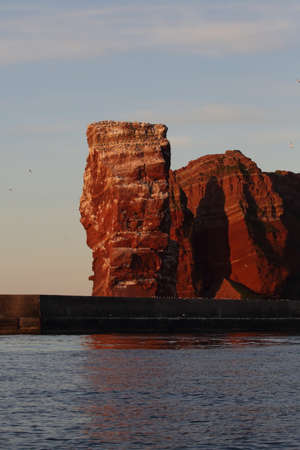 Sunset on the rocky coast, sunset on Helgoland in Germanyの写真素材