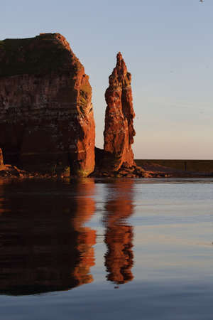 Sunset on the rocky coast, sunset on Helgoland in Germanyの写真素材