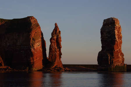 Sunset on the rocky coast, sunset on Helgoland in Germanyの写真素材