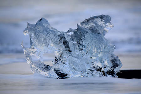 Glacier ice chunks on the black beach at Jokulsarlon, Iceland