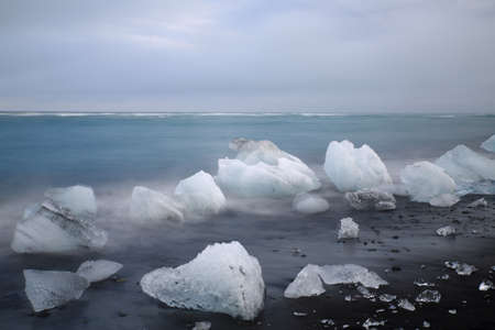 Glacier ice chunks on the black beach at Jokulsarlon, Iceland