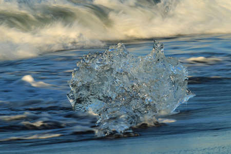 Glacier ice chunks on the black beach at Jokulsarlon, Iceland