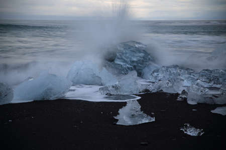Glacier ice chunks on the black beach at Jokulsarlon, Iceland
