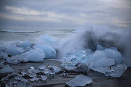 Glacier ice chunks on the black beach at Jokulsarlon, Iceland