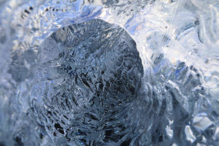 Glacier ice chunks on the black beach at Jokulsarlon, Icelandの写真素材