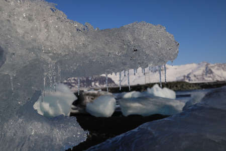 Glacier ice chunks on the black beach at Jokulsarlon, Iceland