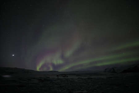 Aurora Borealis or Northern Lighs, over the JÃ¶kulsarlon, Icelandの写真素材