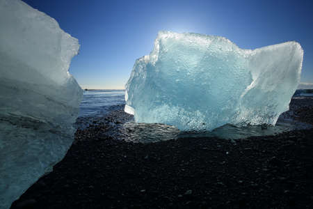 Glacier ice chunks on the black beach at Jokulsarlon Iceland