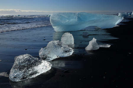 Glacier ice chunks on the black beach at Jokulsarlon Iceland