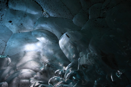 Ice cave at the northern shore of glacial lagoon Joekulsarlon in glacier Breidamerkurjoekull in...