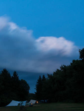 Tents in a field of a dutch campingの写真素材