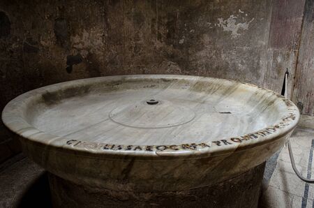 Ruins of Pompeii buried by the eruption of Vesuvius. Ruins of different rooms with frescoes painted on the walls.の写真素材