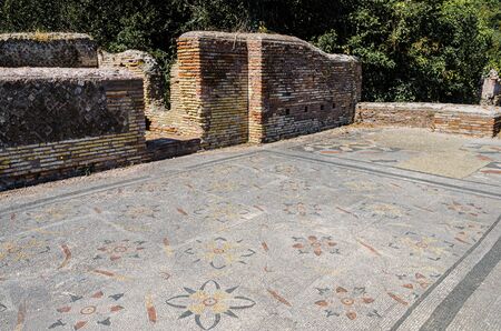 Mosaics of the ancient coastal city of Ostia, Italy. Ostia Antica was an ancient city on the coast of the Tyrrhenian Sea, which served as the port of ancient Rome.の写真素材