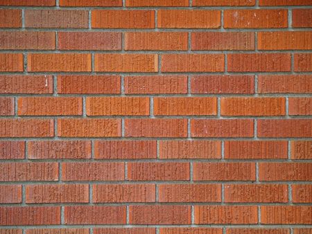 Brick wall backgrounds, all in good repair,  in various shades of red, orange, brown, tan, and white.   の写真素材
