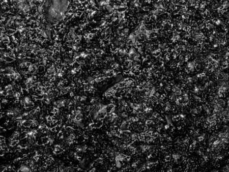 A shiny concrete wall background with an abstract grunge look