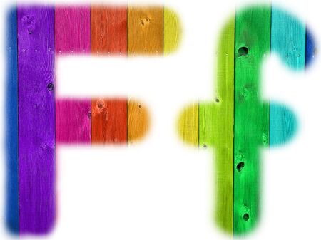 The letter F with a wooden rainbow backgroundの写真素材