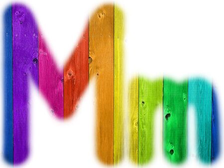 The letter M with a wooden rainbow backgroundの写真素材