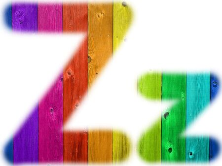 The letter Z with a wooden rainbow backgroundの写真素材