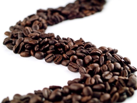 Whole Coffee Beans on a White Backgroundの写真素材