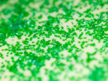Cookie and Cake Icing and Green Colored Sugarの写真素材