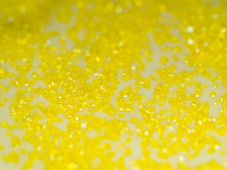 Cookie and Cake Icing and Gold Colored Sugarの写真素材