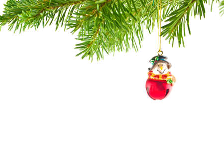 Christmas Tree Holiday Ornament Hanging from a Evergreen Branch Isolatedの写真素材
