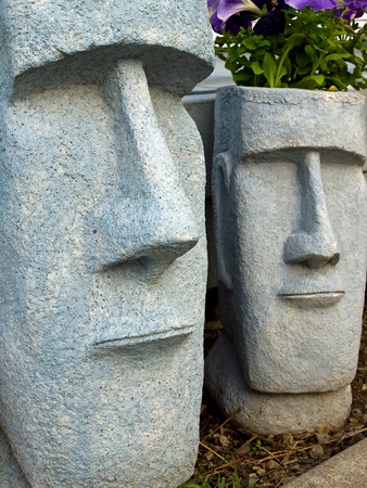 Easter Island Planters with Purple Flowers Growingの写真素材