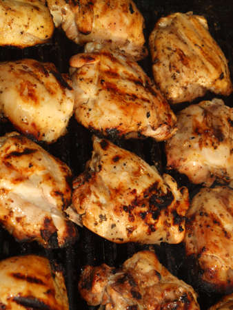 Fresh Grilled Chicken Cooking on the Barbecueの写真素材