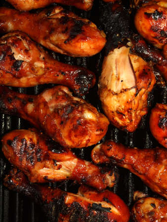 Fresh Grilled Chicken Cooking on the Barbecueの写真素材