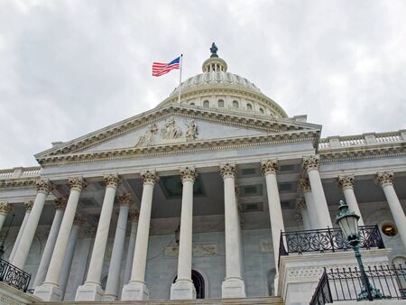 United States Capitol Building in Washington DC with American Flag