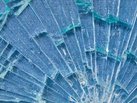 Cracked Glass Macro with a Sky Blue Patterned Background