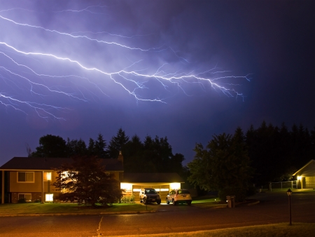 Lightning Flashes Across a Stormy Night Skyの写真素材