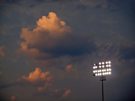 Stadium Lights Against an Evening Sky at Duskの写真素材