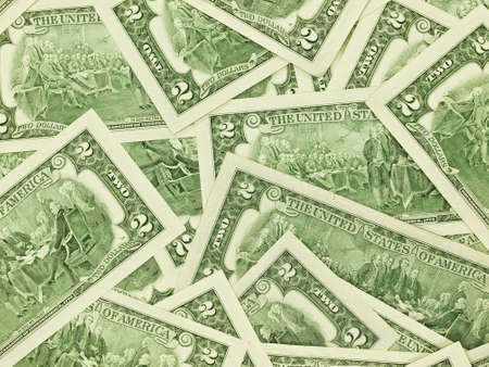 A Pile of Two Dollar Bills Face Down as a Money Backgroundの写真素材