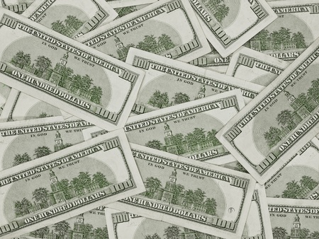 A Pile of Hundred Dollar Bills Face Down as a Money Backgroundの写真素材