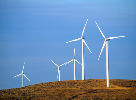 A Windmill Farm on a Mountain at Dusk