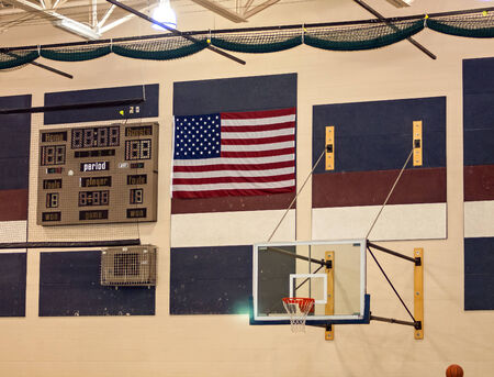 Basketball Hoop with Backboard and Scorboard and American Flagのeditorial素材