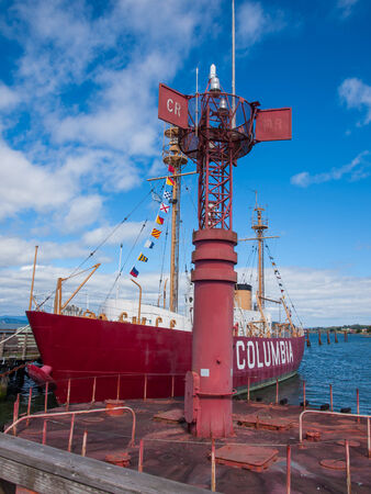 Columbia Lightship and Modern Navigational Buoy in Astoria Oregon USA on a Clear Dayのeditorial素材