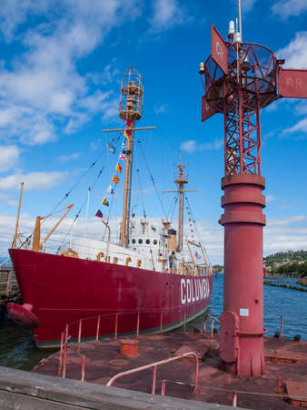 Columbia Lightship and Modern Navigational Buoy in Astoria Oregon USA on a Clear Dayのeditorial素材