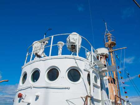 Columbia Lightship Bridge with Nautical Flags Hanging with Wispy Clouds