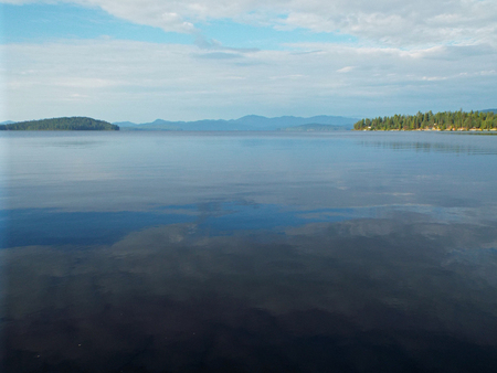 A Mountain Lake Under a Deep Blue Sky Priest Lake Idaho USAの写真素材