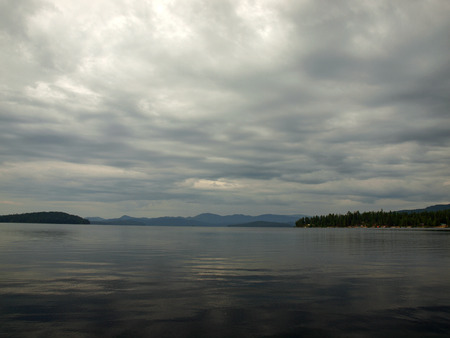 A Mountain Lake Under a Cloudy Sky Priest Lake Idaho USAの写真素材