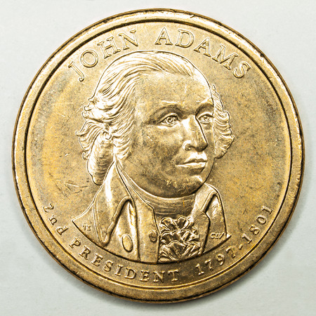 US Gold Presidential Dollar Featuring John Adamsの写真素材