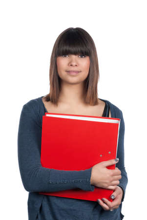 Cut out image of a young woman who holds a red fileの写真素材