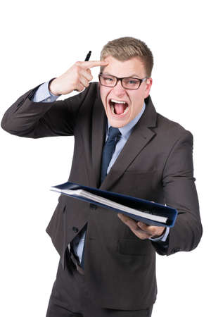 The man is shouting and pointing to his forehead with one fingerの写真素材